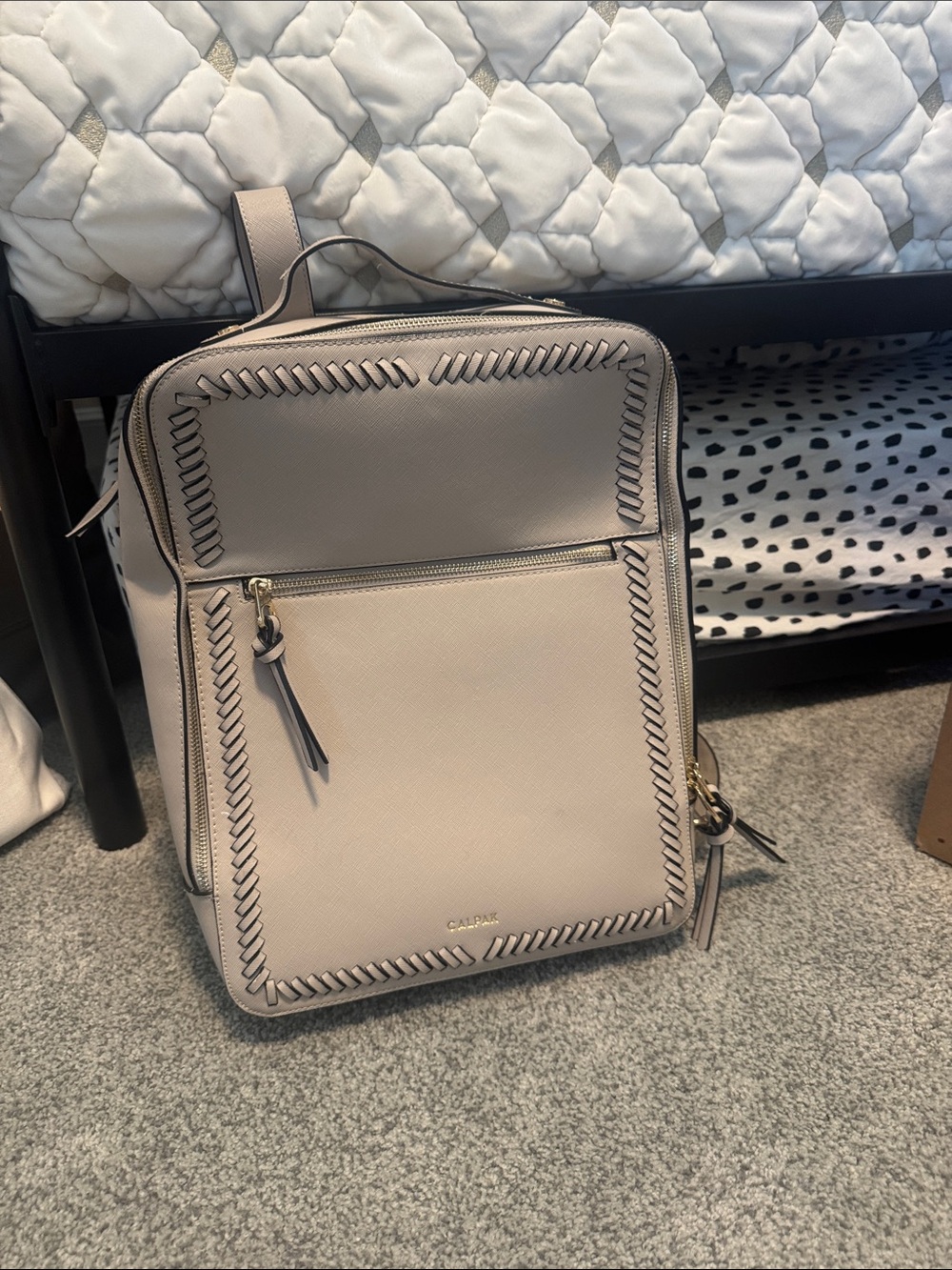 Calpak light beige woven-edge structured backpack